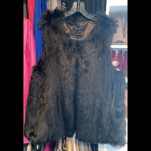 Faux fur vest.. Stylish & Cute…bag sold separately